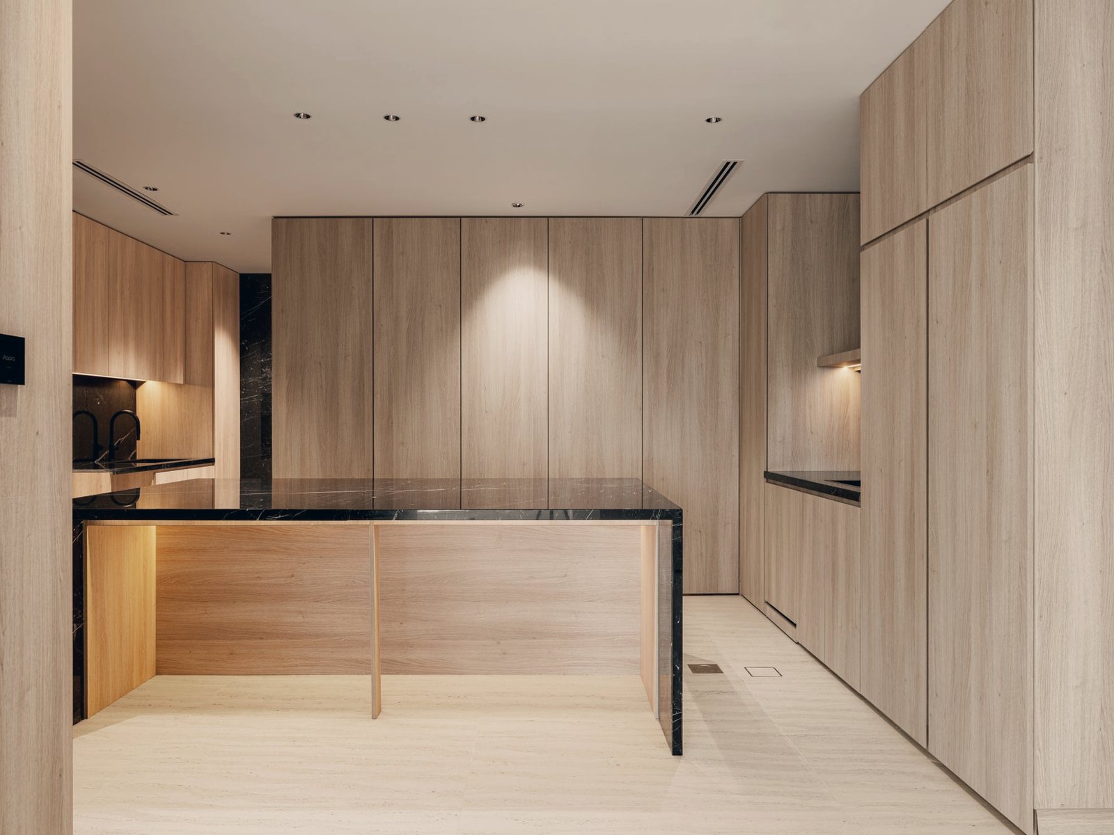 Temporary photograph of a warm timber interior with a long counter